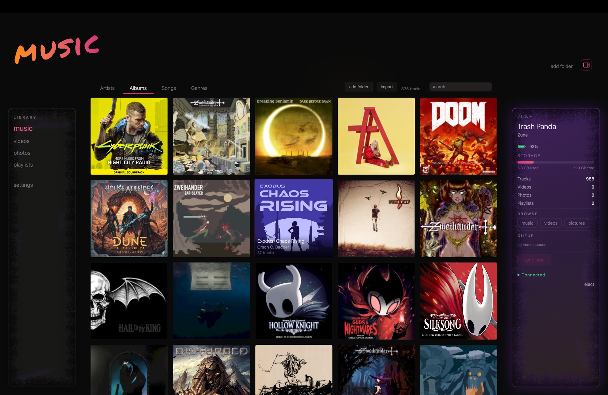 Zuuned music library view showing album grid with connected Zune device panel